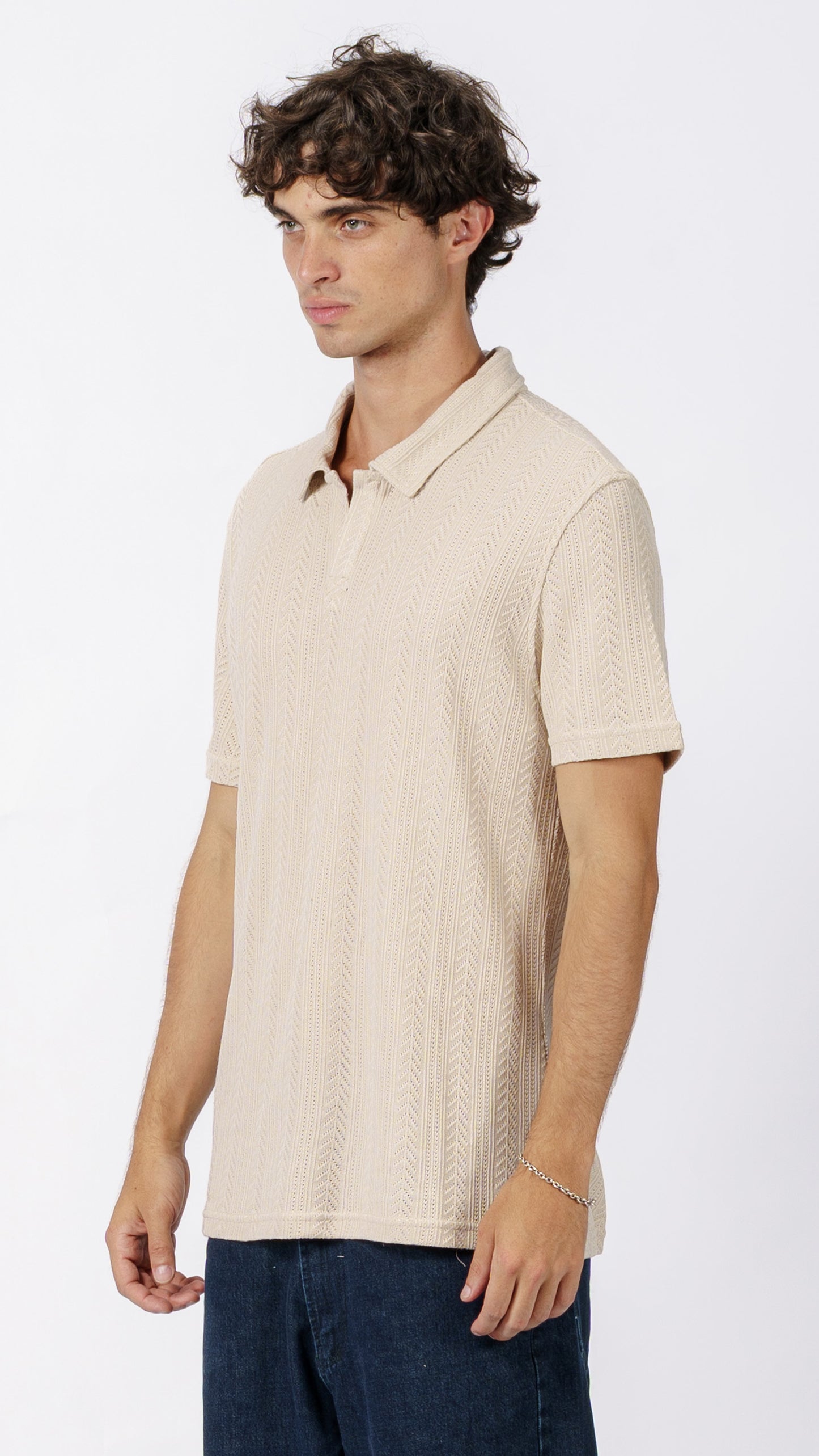 Beige polo T-shirt with a subtle pattern