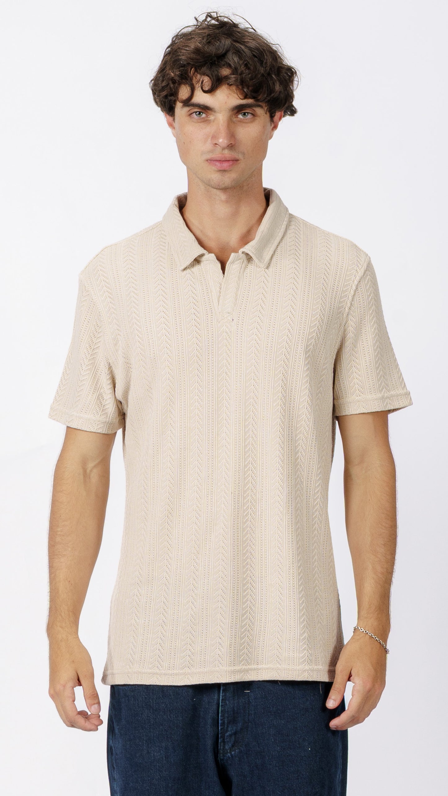 Beige polo T-shirt with a subtle pattern