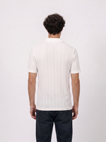 Beige polo T-shirt with a subtle pattern