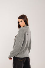 distressed knit sweater In Grey